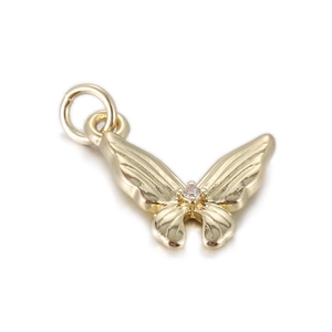 Detail of a butterfly pendant in gold plating with a sparkling zircon center stone