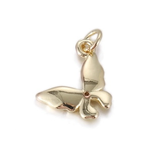 Detailed close-up of a mini golden butterfly pendant with a polished mirror finish