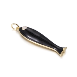 Close-up of black enamel fish pendant with gold edges and white pearl eye detail