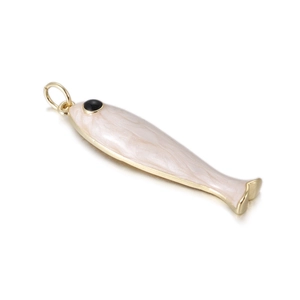 Detailed macro view of a light pink fish-shaped pendant with gold-plated metal edges