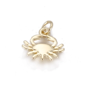 Detailed view of a mini golden crab ocean-style charm with top metal jump ring