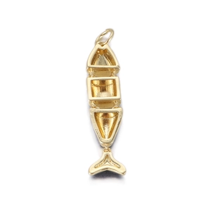 Detailed view of flexible gold-tone articulated fish pendant for DIY jewelry making