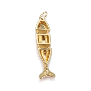 Detailed view of a gold-toned fish bone pendant with movable joints and minimalist design