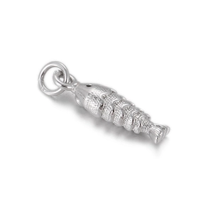 Detail of silver metal fish pendant with multi-section structure and fine scale texture