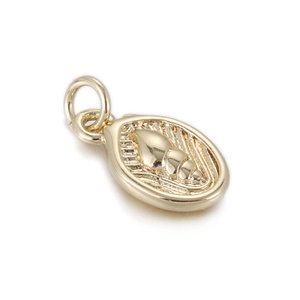 Detailed view of an oval gold-plated pendant featuring an embossed conch shell design
