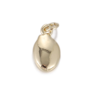 Detailed close-up of a polished gold teardrop pendant with a secure jump ring for DIY jewelry