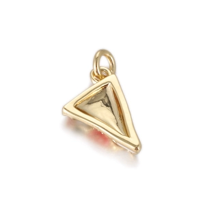 Close-up of golden triangular charm pendant with polished finish and metal top ring