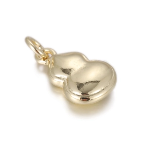 Detailed view of a polished gold gourd pendant with a high-shine reflective finish