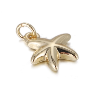 Close-up of polished gold starfish pendant with a smooth mirror finish and bail connector