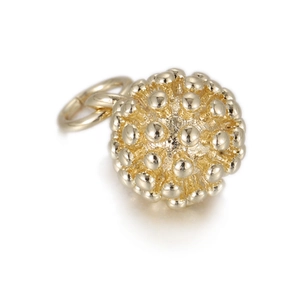 Macro shot of a golden spherical bead pendant featuring a textured granule surface finish