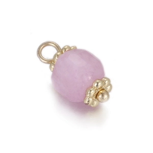 Macro view of a geometric faceted lavender stone pendant with a gold-plated flower-shaped cap