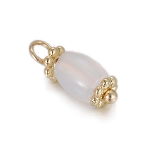 Detail of opal barrel pendant with golden petal caps and polished metal bail