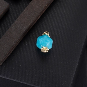 Geometric blue natural stone pendant with gold hexagonal caps and polished turquoise finish