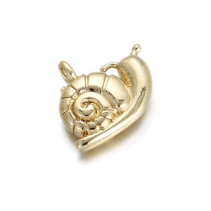 Detail of a gold snail charm with spiral textures and a polished finish for DIY jewelry