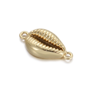 Detailed close-up of a golden cowrie shell charm with textured surface for DIY jewelry