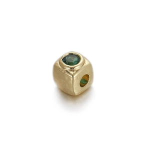 Detail of 14k gold-plated cube spacer bead with a centered green zircon inlay for DIY jewelry