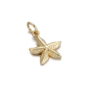 Macro detail of a golden starfish pendant with realistic textured finish and top ring loop