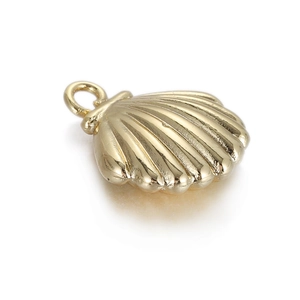 Macro shot of gold-plated seashell pendant with detailed radial texture and sturdy bail