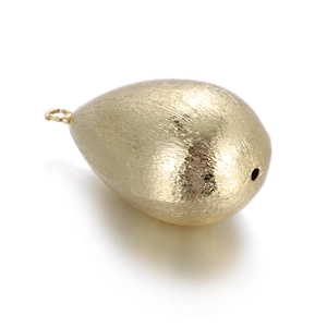 Detail of teardrop 14k gold plated spacer bead with brushed metal texture and mirror finish