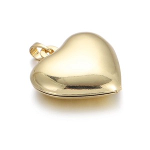 Close-up of heart-shaped 14k gold-plated brass locket with a high-polished mirror finish