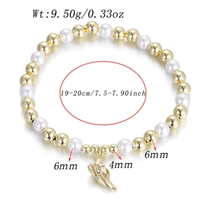 Detail view of chunky gold bead bracelet with pearls and custom pendant size dimensions