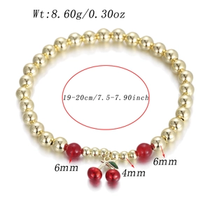 Detailed view of cherry pendant beaded bracelet with size markings and 19-20cm circumference