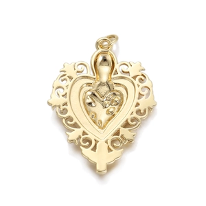 Detailed view of a gold hollow heart pendant with wavy edges and embossed center design