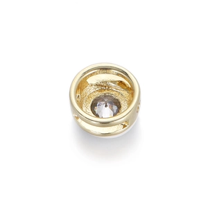 Detail view of 14K gold plated heart palm bead with sparkling cubic zirconia inlay