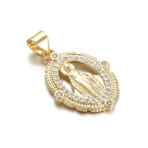 Detailed view of a gold-plated Virgin Mary oval pendant with sparkling zircon borders
