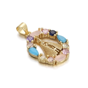 Detailed macro view of the golden Virgin Mary pendant with colorful zirconia gemstones