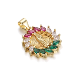 Detail of gold-plated Virgin Mary pendant with colorful marquise-cut zircons and sunburst