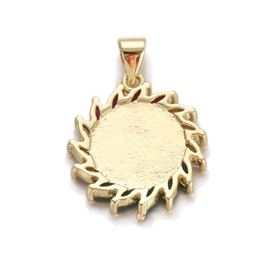 Macro view of the textured gold-plated flower pendant back with polished bail