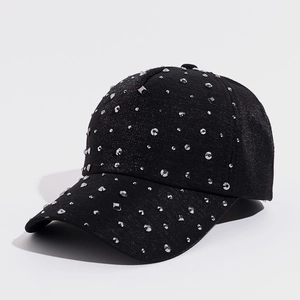 Women's black baseball cap with silver metallic studs and sparkling fabric texture