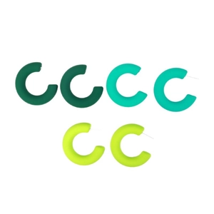 Three pairs of gradient green C-shaped matte acrylic hoop earrings on white background