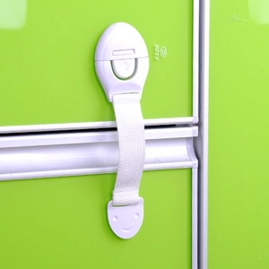 White KEDO child safety lock with durable strap for cabinets, drawers and refrigerators