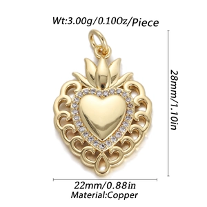 Gold heart pendant with filigree pattern, white stones and Virgin Mary cross design