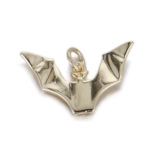 Polished gold bat pendant detail with wing textures and top loop on a white background