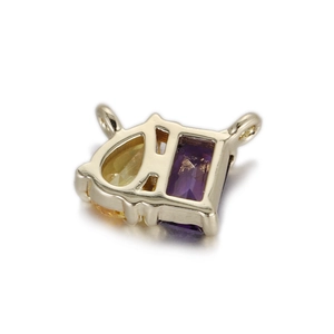 Détail du pendentif avec zircon jaune en poire et gemme rectangulaire violette