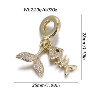 Detail view of golden fish tail and fish bone charms with dimensions 28mm by 25mm
