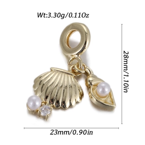 Detailed view of gold ocean shell pendant with white pearls and sparkling cubic zirconia