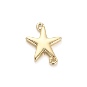 Detailansicht eines goldfarbenen Seestern-Verbinders mit zwei Ösen für DIY-Schmuck