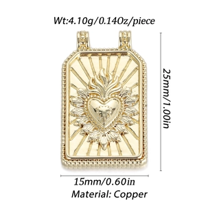 Detail of a vintage 14K gold plated brass sacred heart pendant with dimensions and weight