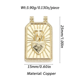 Golden Sacred Heart pendant in copper with size specs 25mm by 15mm on white backdrop