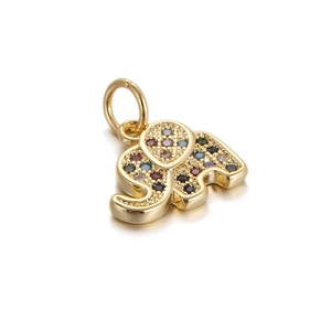 Macro shot of gold elephant pendant with multicolored zircon inlay and top hanging ring