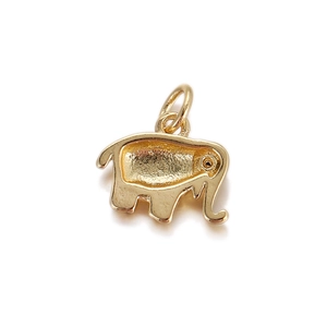 Macro detail of golden elephant charm with frosted metal finish and top ring for DIY jewelry
