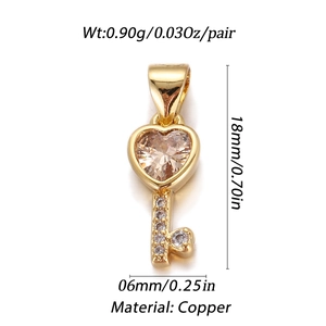 Detail of copper heart key pendant with champagne stone and micro-inlaid diamonds