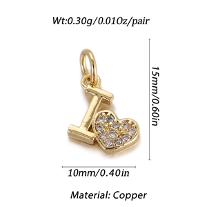 Detailed view of gold-plated copper letter I charm with micro-pave crystal heart