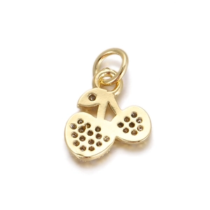 Detailed close-up of golden cherry pendant with honeycomb texture for DIY jewelry