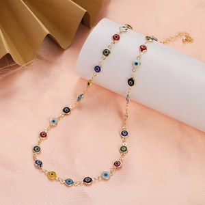 Detailed view of handmade colorful Evil Eye gold-plated necklace with adjustable chain