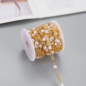 DIY gold leaf and heart pearl tassel chain for jewelry making on white spool